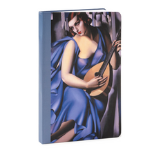 Woman in blue with a guitar - Journal